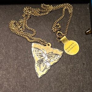 Vintage pewter pendant shaped shark tooth
butterfly design sterlingsilver signed